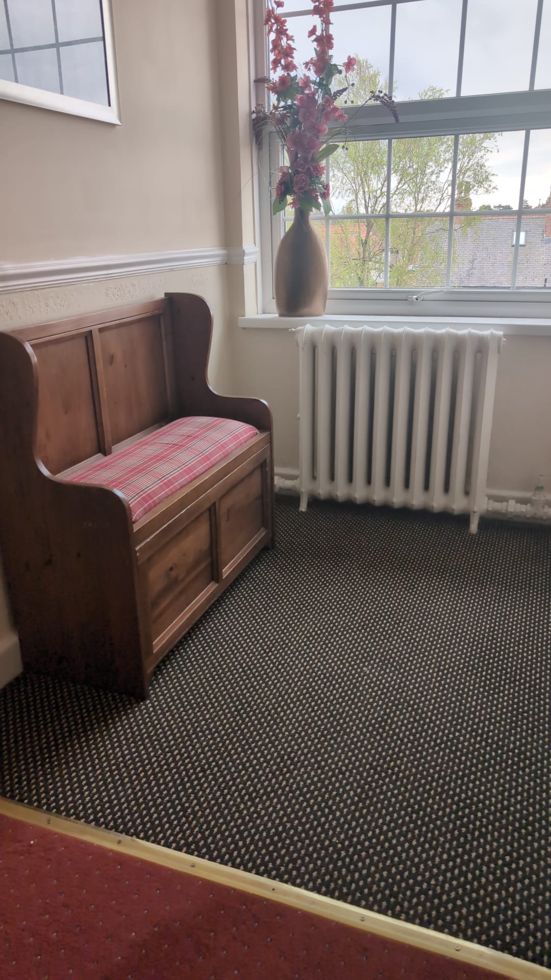 Seating nook off a guest corridor
