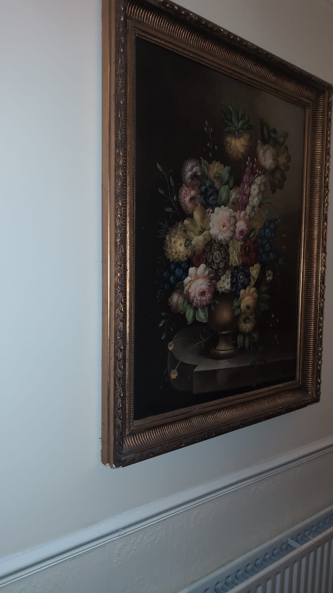 Floral painting hung in the lobby