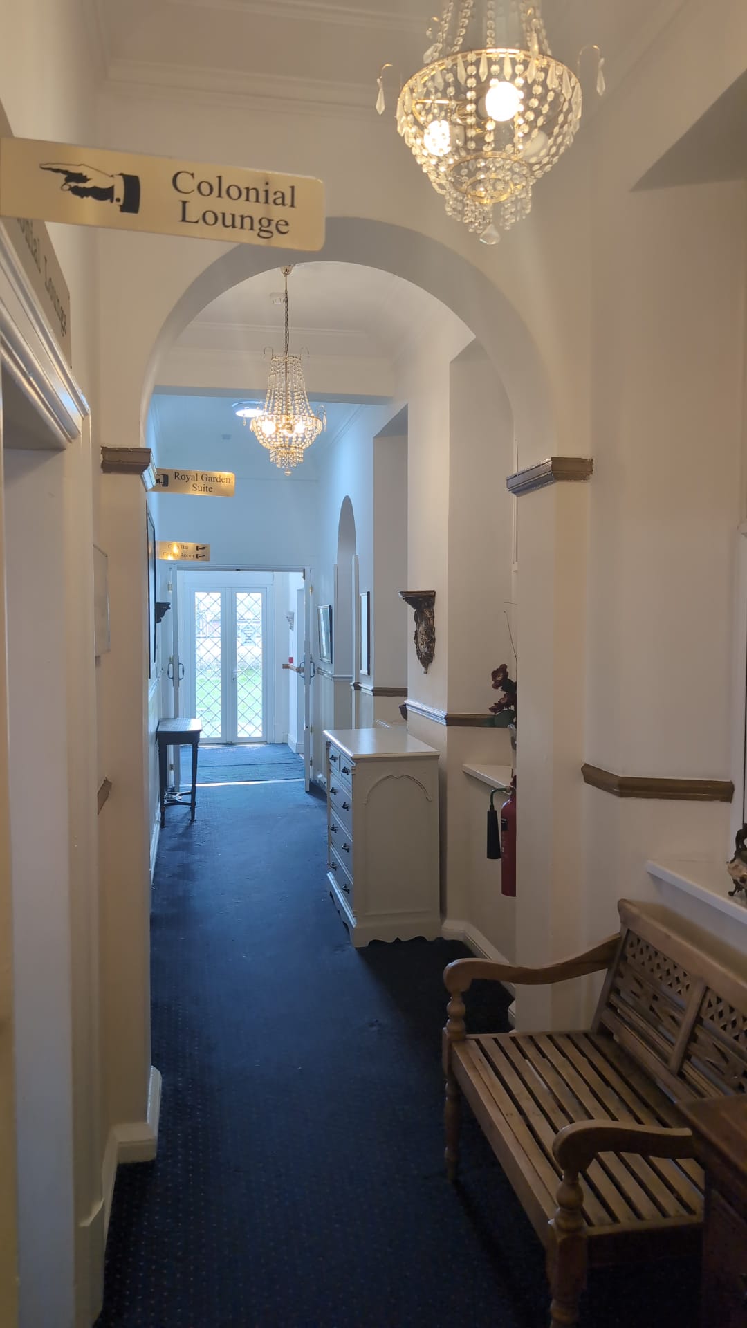 Colonial-style hallway with archways