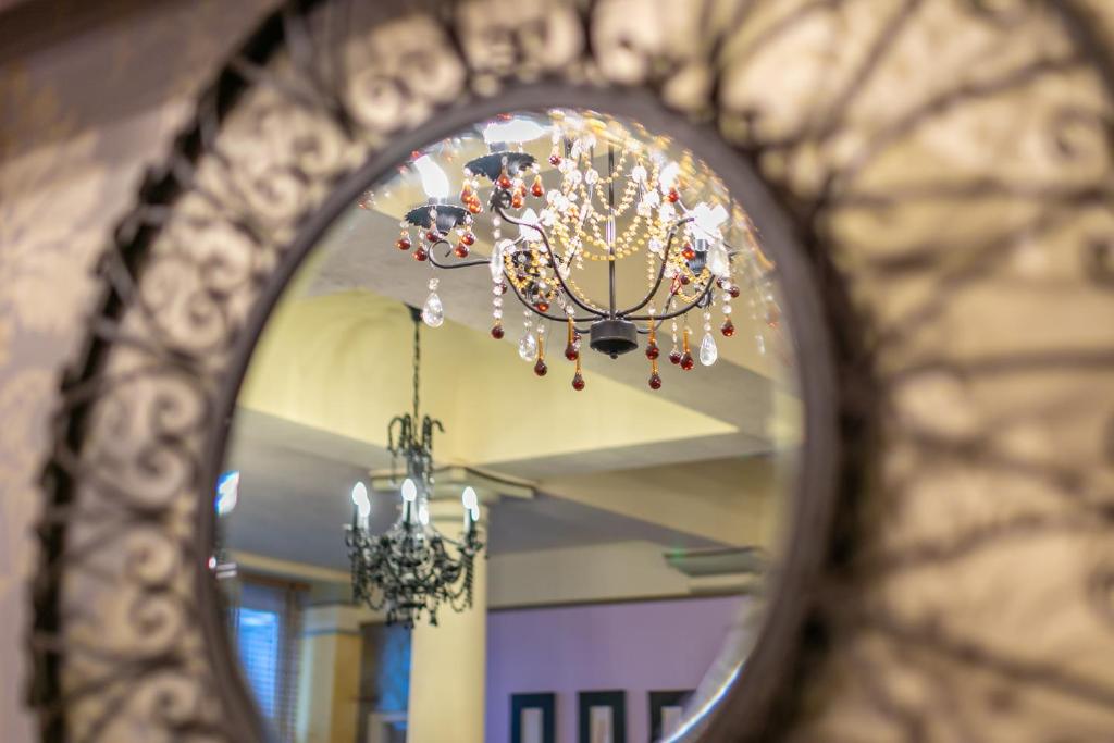 Two chandeliers reflected in ornate mirror - The Royal Hotel, Skegness