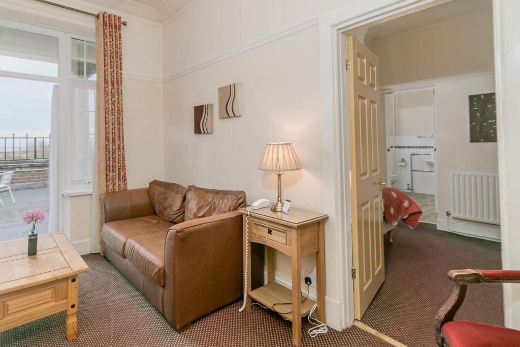 Executive Double suite sitting room with balcony doors