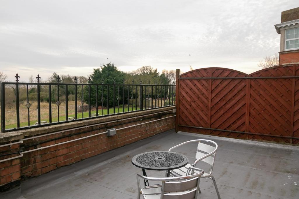 Cafe seating on the Deluxe balcony